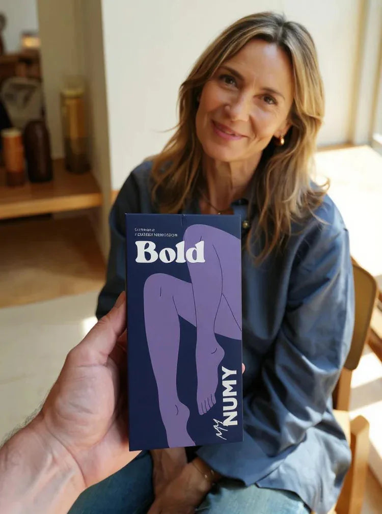 A NUMY customer holding her Bold box